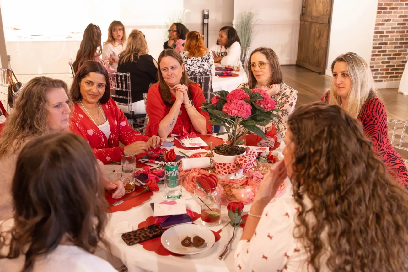 Group of single women in discussion at table